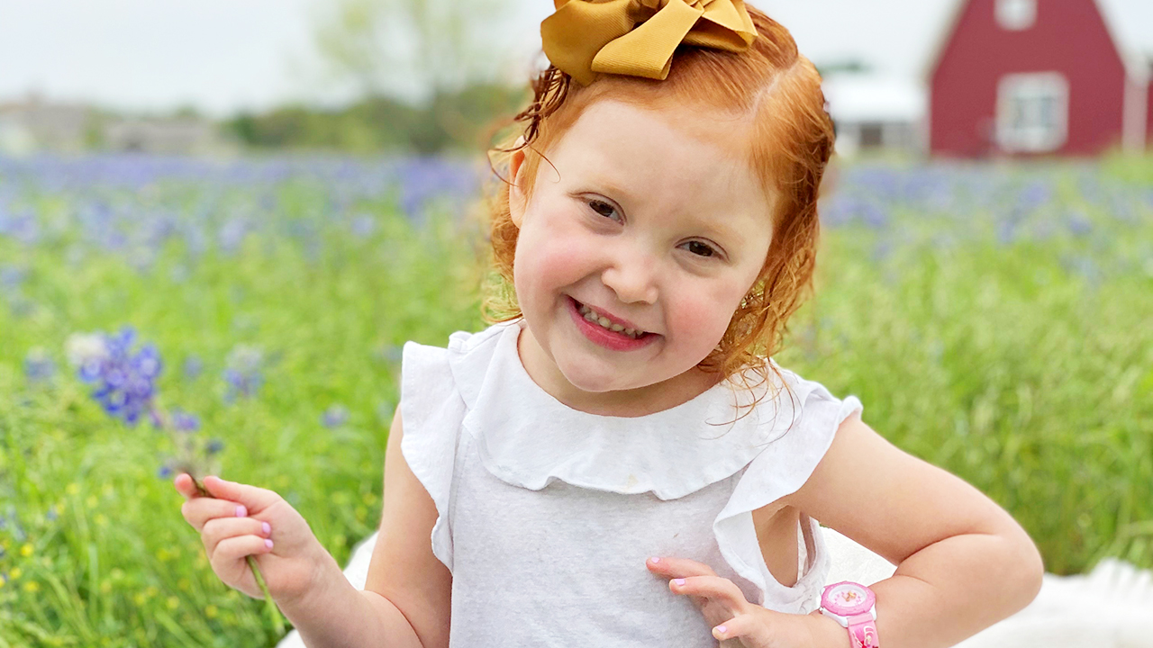 Image of Addie smiling and laughing