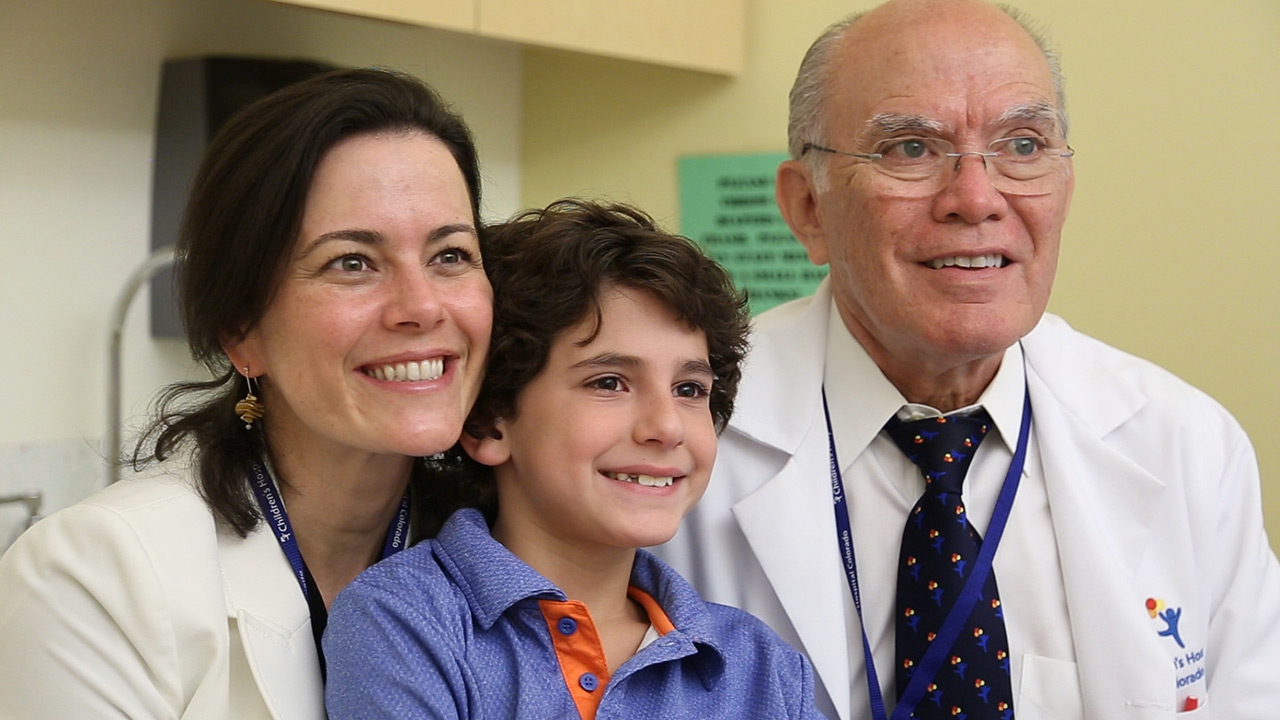 Patient Darius with colorectal surgeons Dr. Pena and Dr. Bischoff