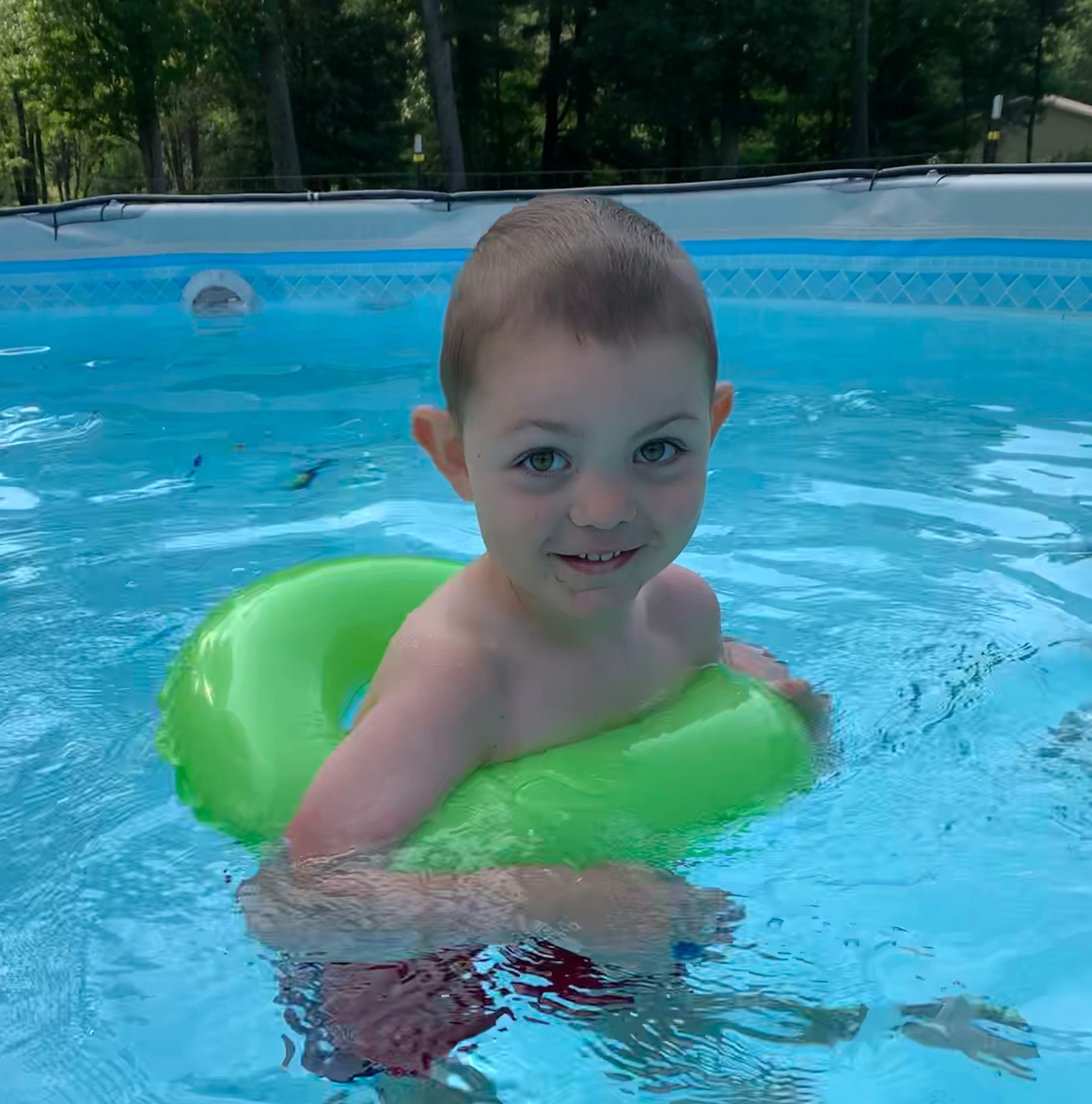 Noah seen here swimming – something his family wasn’t sure he’d be able to ever do.