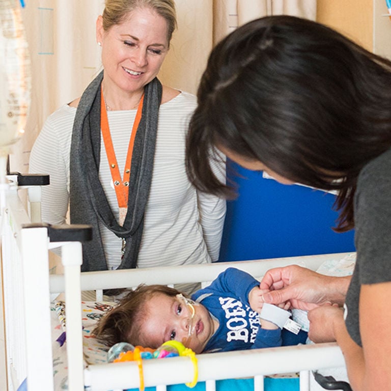 Nurse working with child