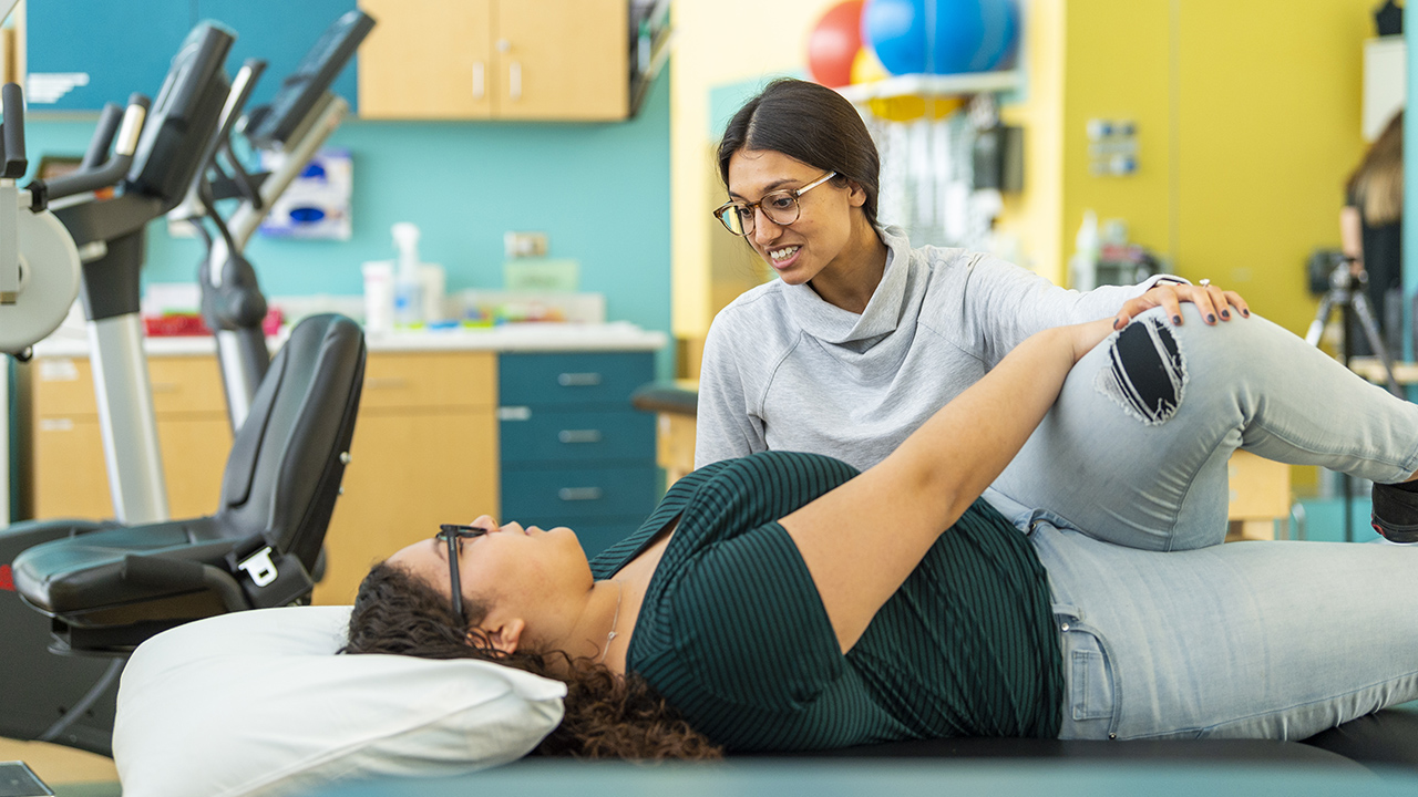 Women giving physical therapy