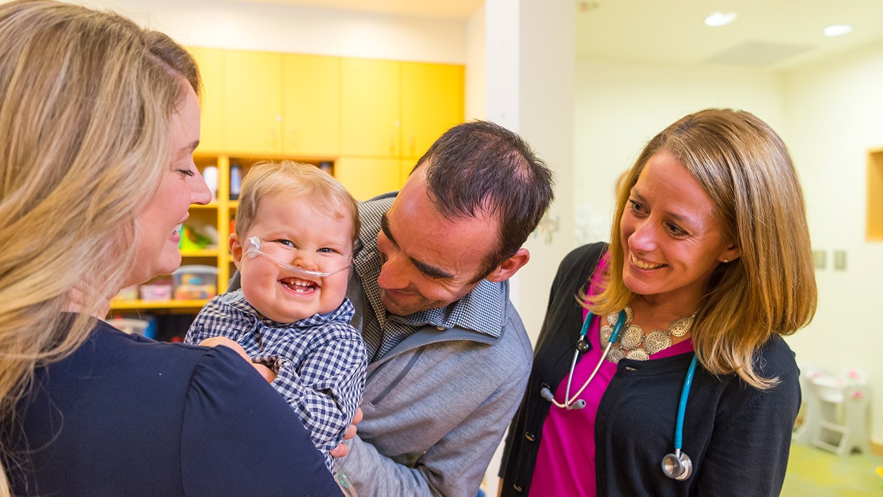 Jason Gien, MD, and Alicia Grenolds, CPNP, with Noah and Melissa Lindsay at Children’s Colorado in fall 2017.