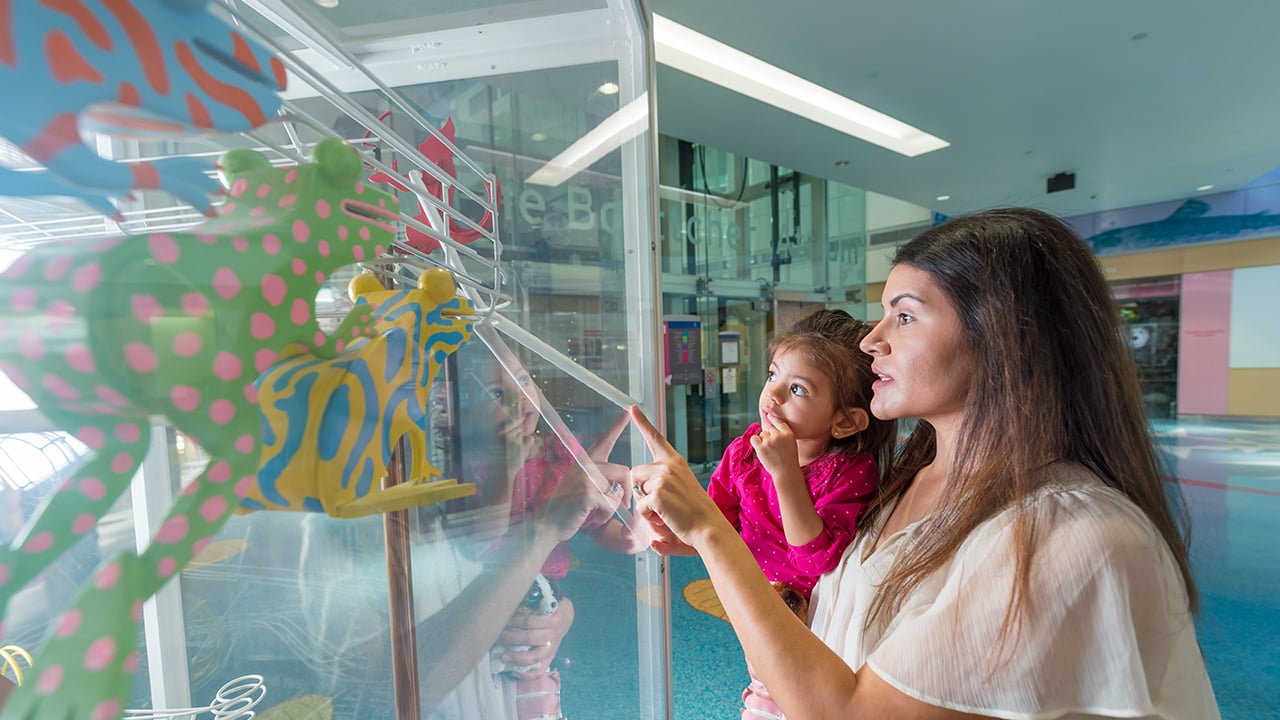 Mom and daughter in Children’s Hospital Colorado atrium