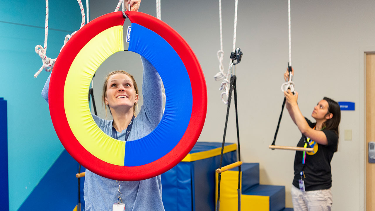 Therapists setting up equipment in Highlands Ranch