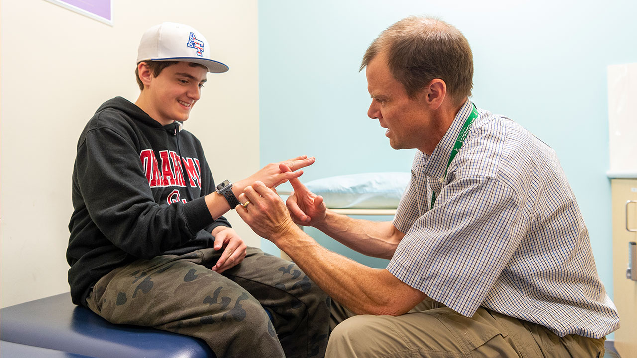 Doctor and patient at Therapy Care, Highlands Ranch