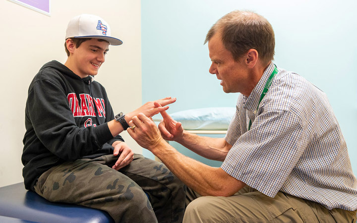 Doctor and patient at Therapy Care, Highlands Ranch