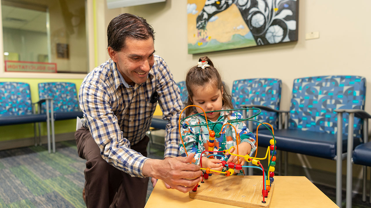 Children's Colorado Outpatient and Urgent Care, Wheat Ridge parent with child in waiting room