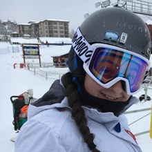 A kid in full ski gear at Children's Hospital Colorado's winter burn camp.