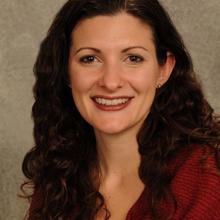 doctor danielle soranno md childrens hospital colorado kidney center long dark brown hair red sweater smiling headshot  