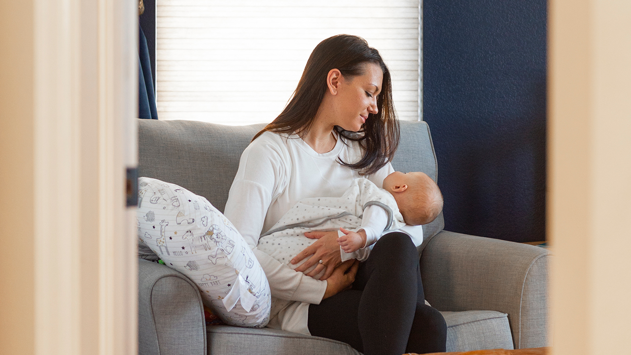 Mother holding baby Emory