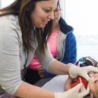 Physician doing check up on young child