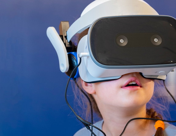 A child experiences virtual reality