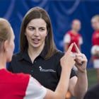 Sports Medicine doctor, Dr. Julie Wilson, performs concussion test with soccer player.