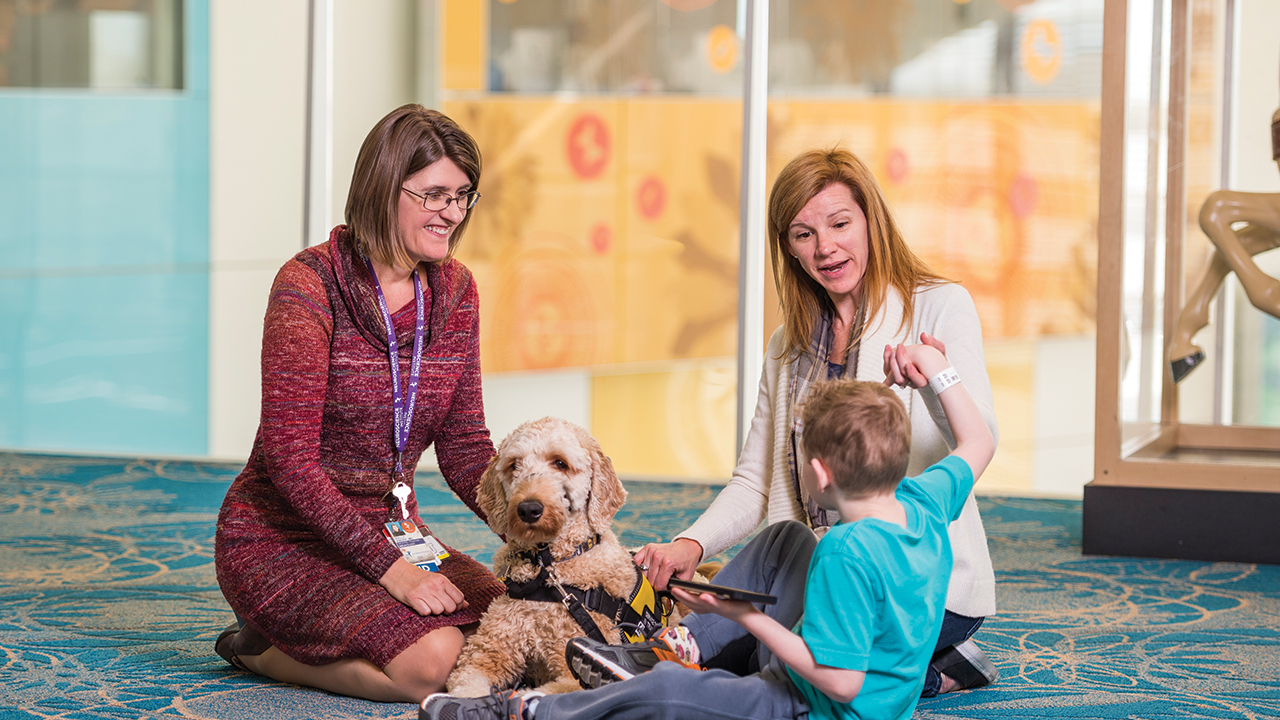 Dr. Kelly Knupp speaks with patient with dravet syndrome.