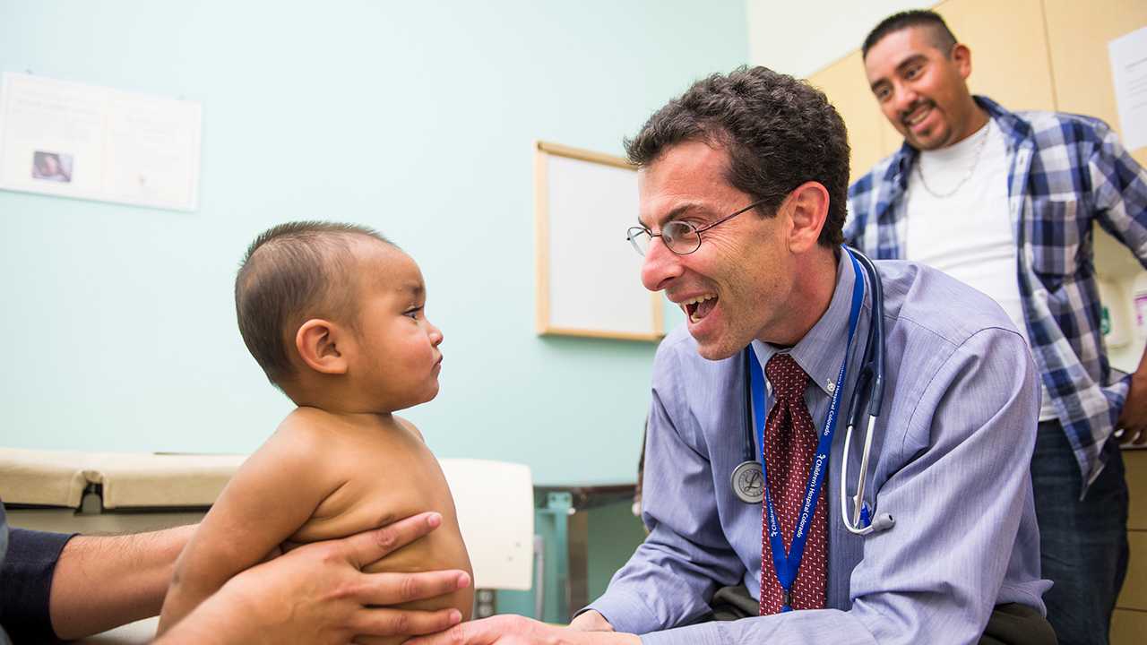 Dr. Scott Sagel treats a young child.