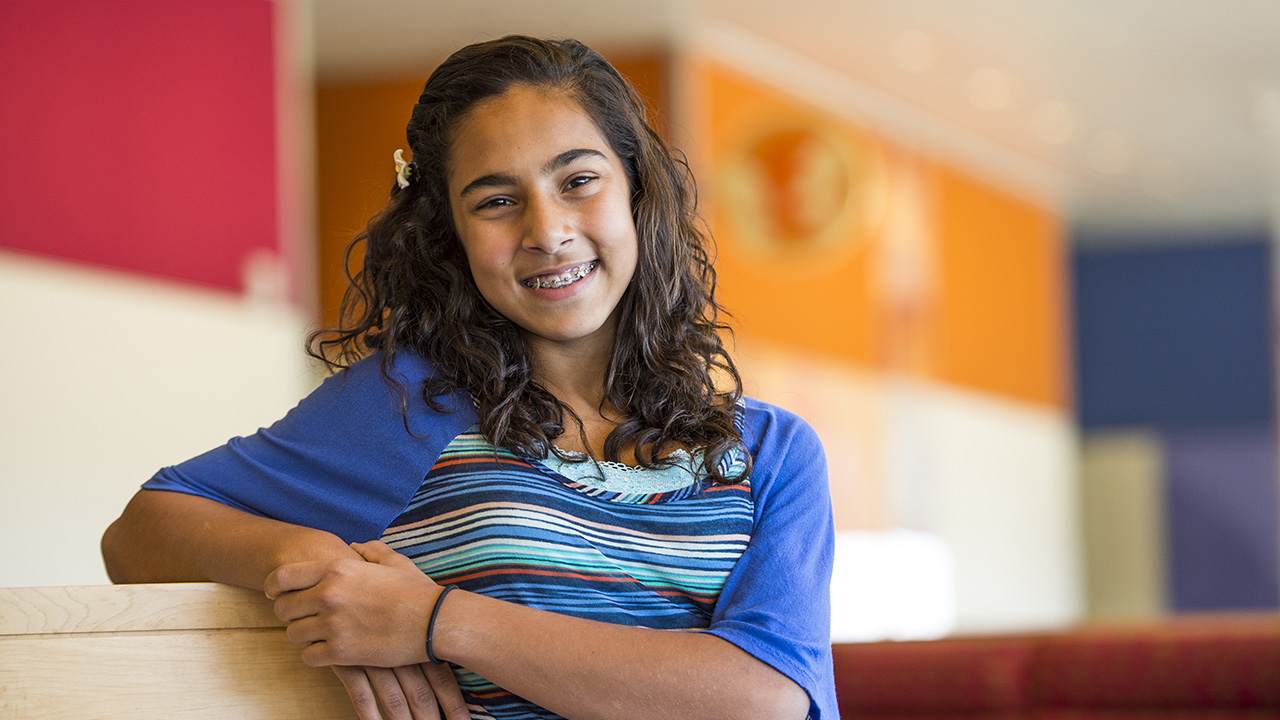 Girl with braces smiling