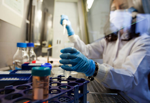 A researcher uses a syringe and test tube