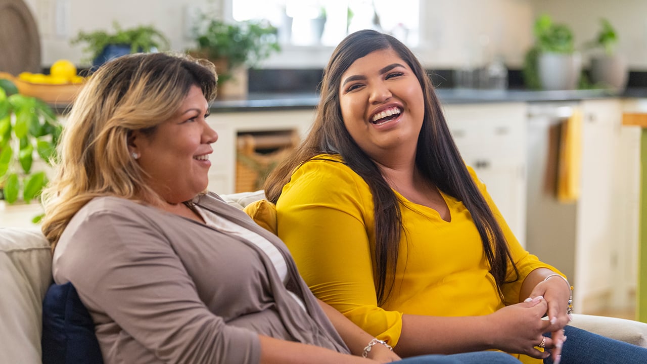 Girl and mom in the waiting room.