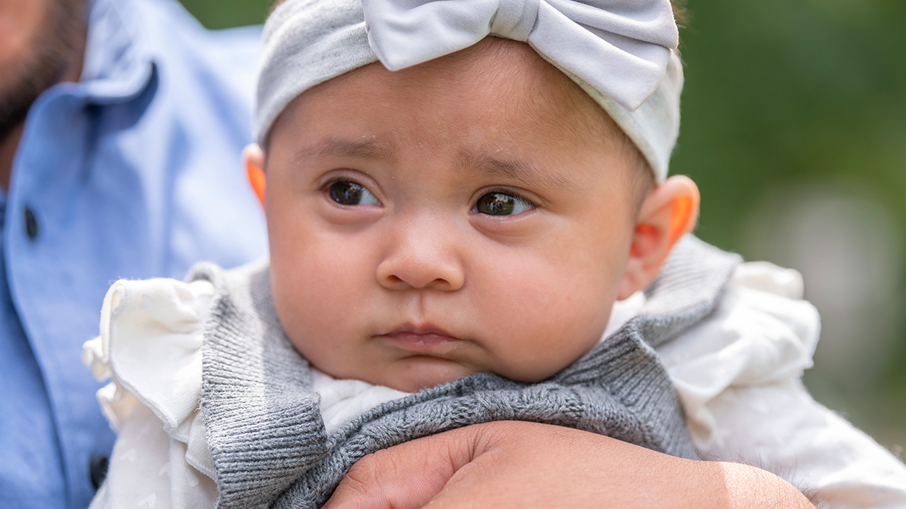 Baby girl being held